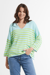 Zaket & Plover Nautical Sweater in Breeze.  Aqua with lime green stripes.  V neck with wide 3/4 sleeve and ribbed cuff.  2 front patch pockets.  Side slits.  Contrast color trim at cuff.  Relaxed fit._t_59643718402414