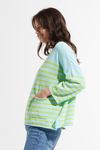 Zaket & Plover Nautical Sweater in Breeze.  Aqua with lime green stripes.  V neck with wide 3/4 sleeve and ribbed cuff.  2 front patch pockets.  Side slits.  Contrast color trim at cuff.  Relaxed fit._t_59643718271342